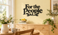 Vinyl wall decal with "For the People" text and laurel leaf design in black