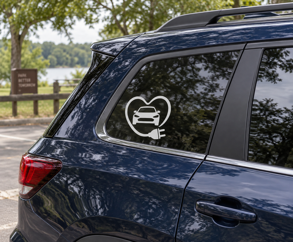 Electric vehicle heart cable vinyl decal on car window, white outline with car and plug