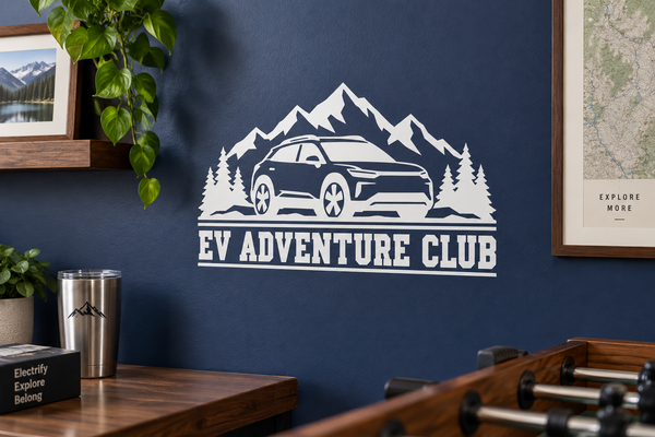 White EV Adventure Club vinyl decal with EV car, mountain peaks, and evergreen trees
