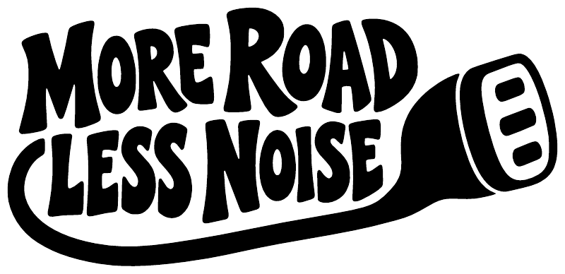 Black-and-white vinyl decal reading 'MORE ROAD LESS NOISE' with icon