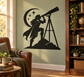 Black vinyl wall decal of an elf with telescope on a tripod beside a crescent moon