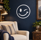 Winking smiley vinyl decal: white circle with wink and smile lines