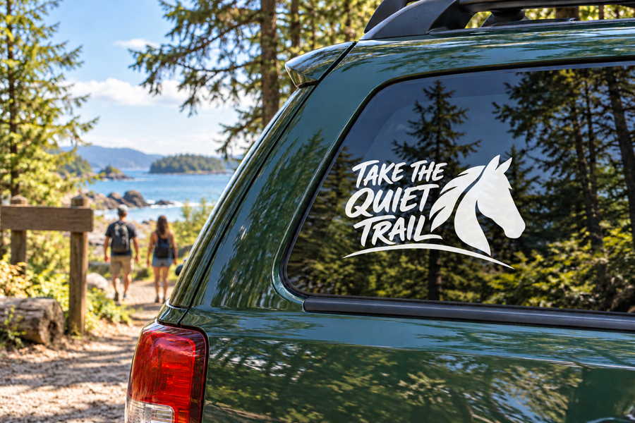 Take the Quiet Trail vinyl decal with white horse silhouette on dark car window