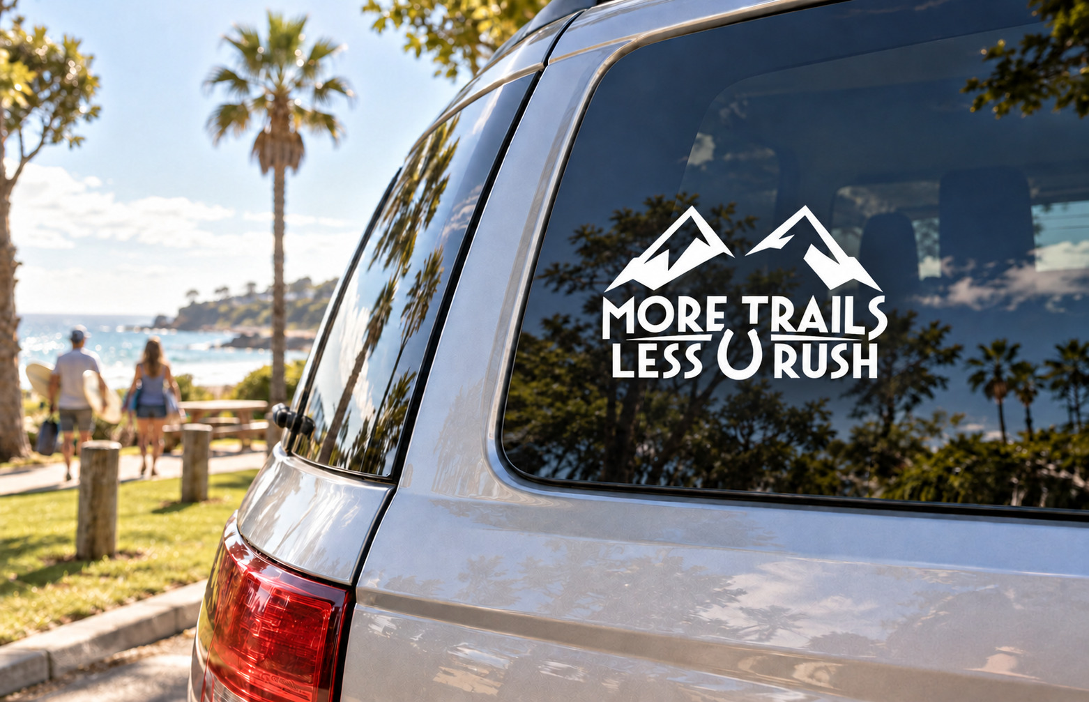 Vinyl decal with black mountains and 'MORE TRAILS LESS U RUSH' lettering