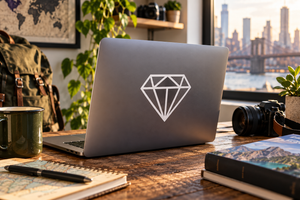 Diamond outline facets vinyl decal on matte laptop lid, geometric diamond icon in white
