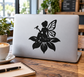 Black fairy vinyl decal with wings and wand on a laptop lid