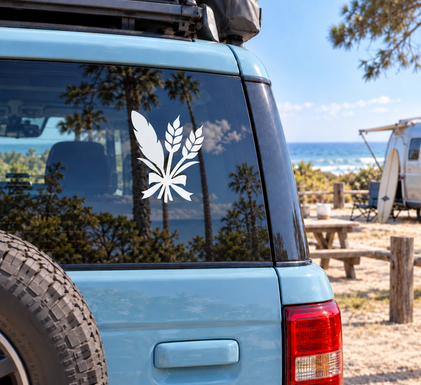 White feather bouquet vinyl decal on blue vehicle window corner