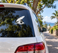 Car window vinyl feather decal in black with white outline and wave detail