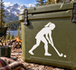 White field hockey player vinyl decal on olive green hard case