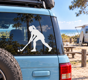 Field hockey player vinyl decal, white silhouette on vehicle window