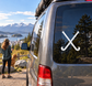 Crossed field hockey sticks vinyl decal on vehicle window, white