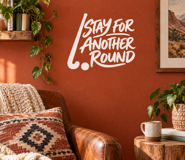 Vinyl decal with white hand-lettered text: "Stay for Another Round"