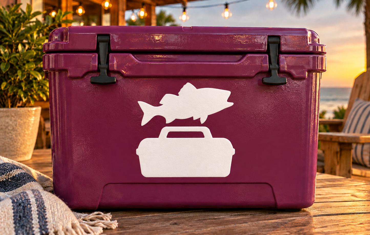 White vinyl fish and tackle box decal on maroon tackle box