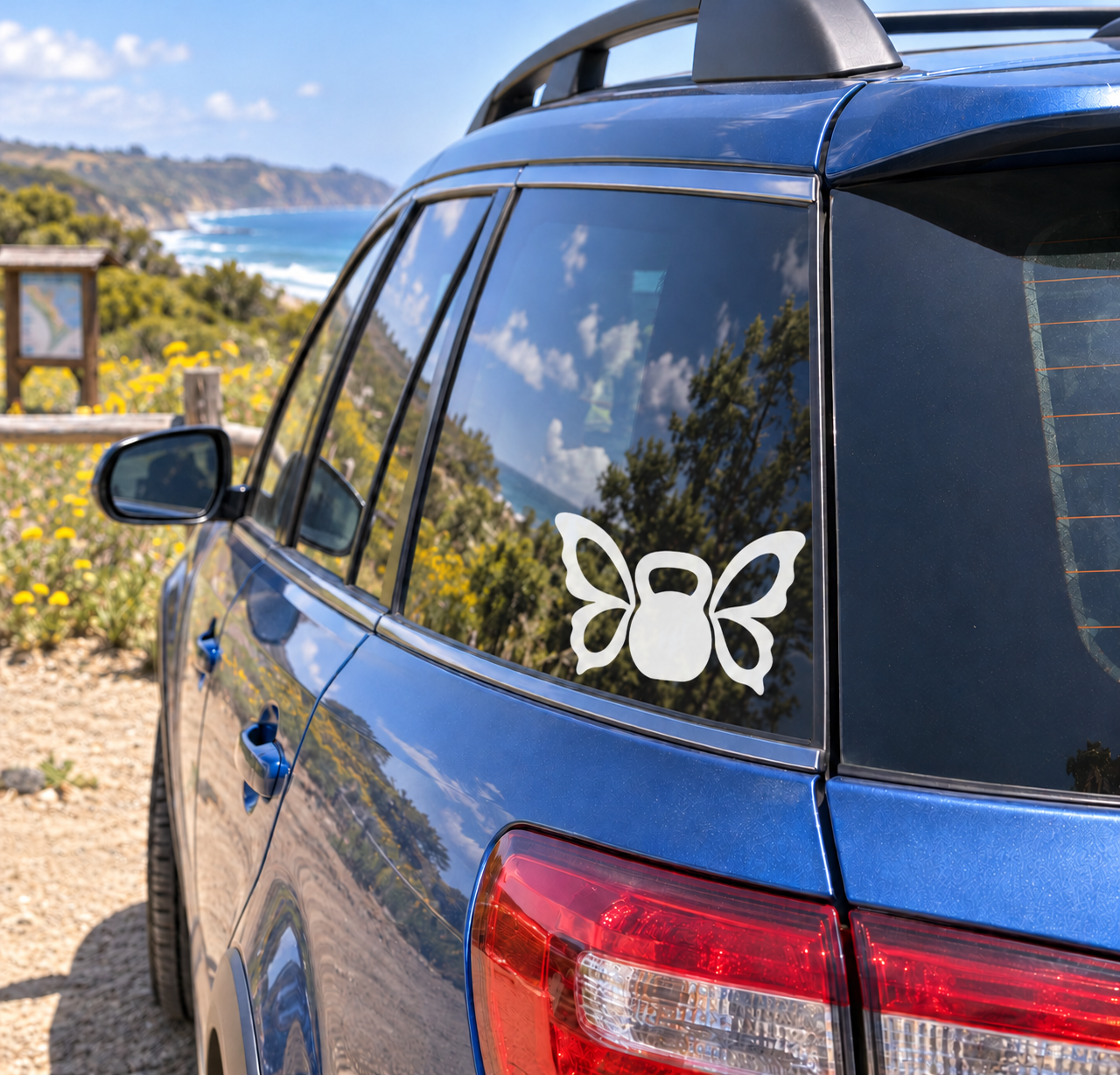 Butterfly balance vinyl decal with white butterfly on blue car rear window