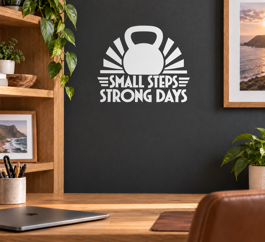 Vinyl decal with kettlebell icon and text “Small Steps Strong Days”