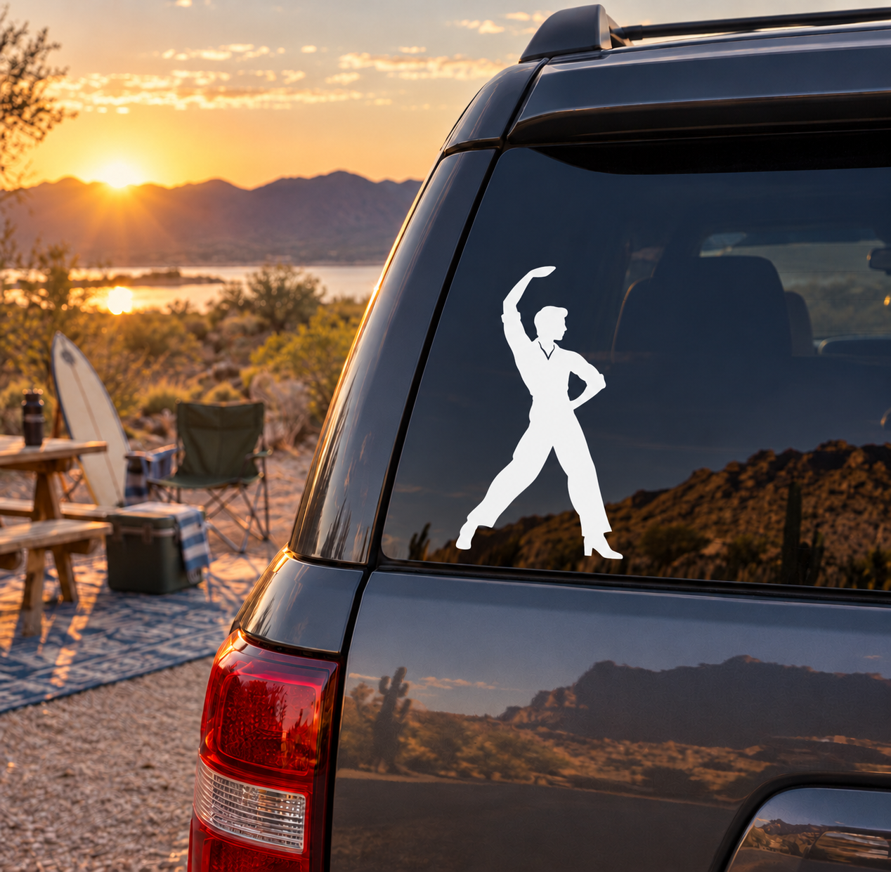 Car vinyl decal of a white flamenco dancer silhouette on a dark rear window