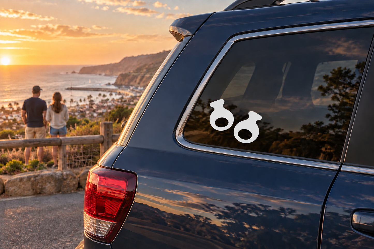 Flamenco castanet vinyl decal pair with two black castanet shapes on car window