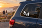 Flamenco castanet vinyl decal pair with two black castanet shapes on car window
