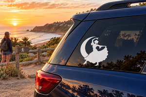 Vinyl car window decal with black flamenco dancer silhouette inside a crescent moon