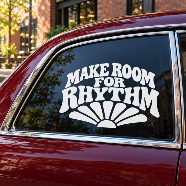White “MAKE ROOM FOR RHYTHM” vinyl decal with black sunburst on a window