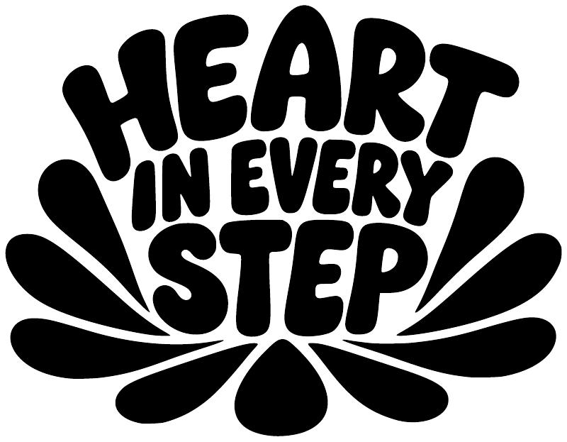 Close-up vinyl decal text: "HEART IN EVERY STEP" in bold black with heartburst