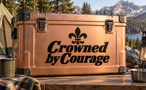 Vinyl decal with black Fleur-de-Lis and text 'Crowned by Courage'.