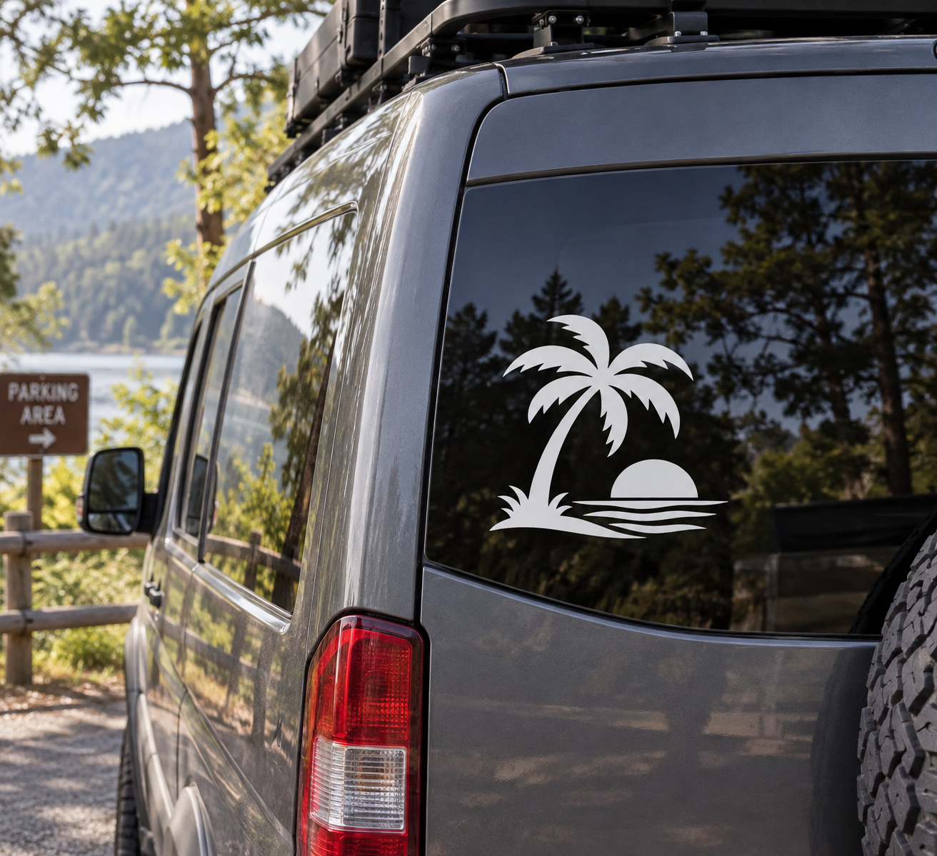 Vinyl palm tree sunset decal on car window, black silhouette with sun and waves