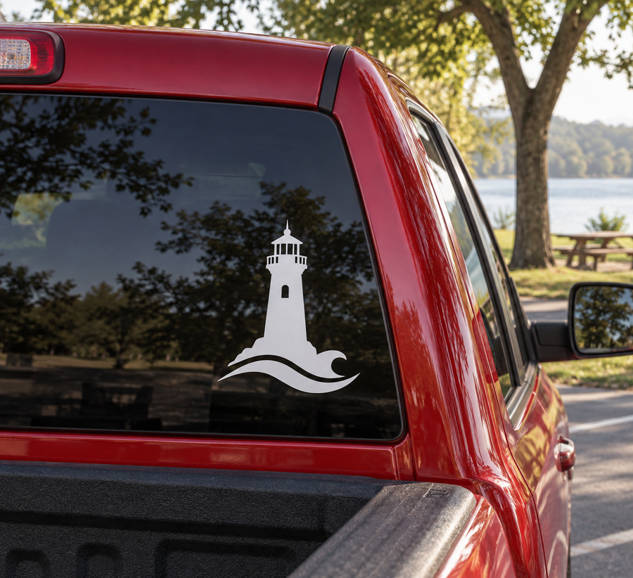 White lighthouse and wave vinyl decal on car window