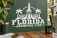 White Florida Adventure Club rocket and palm vinyl decal logo