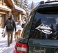 Car vinyl decal with white mountain peak and stylized flying disc logo
