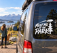 Vinyl decal with “Meet Me at the Park” text and pine tree on car window