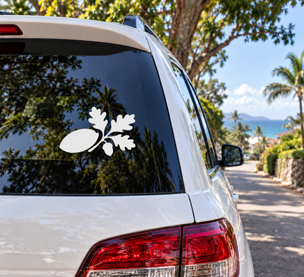 Oak leaf and acorn vinyl decal on car rear window, white outline