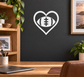 Football heart vinyl decal on dark wall, white outline heart with football and plus symbol