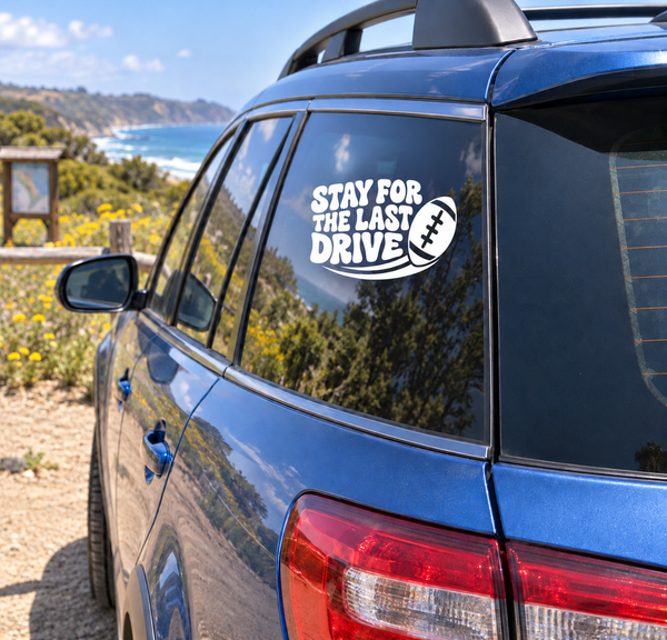Football-themed vinyl car decal with white 'STAY FOR THE LAST DRIVE' text and black-and-white ball
