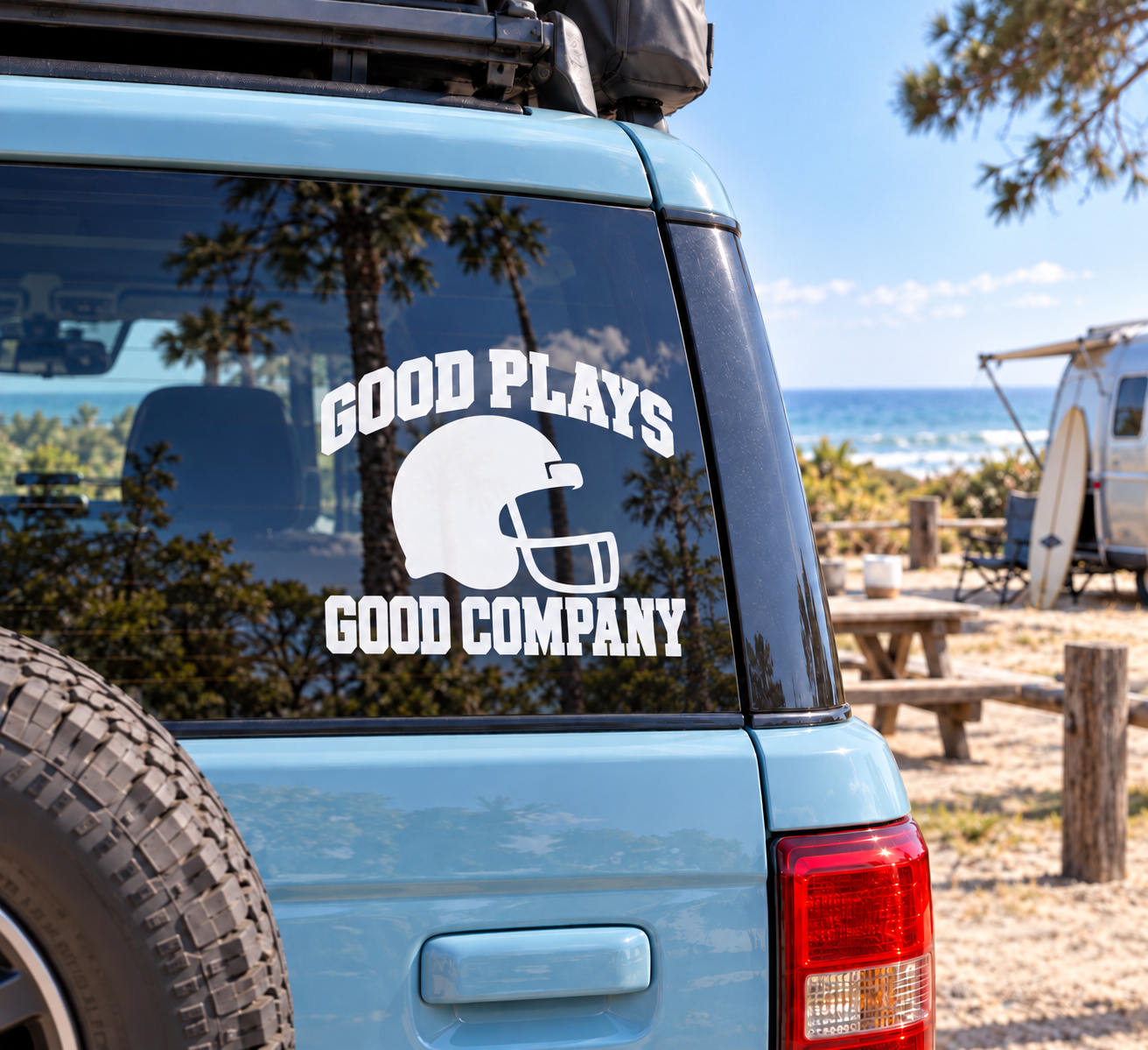 Football helmet vinyl decal: 'Good Plays' and 'Good Company' text on a car window