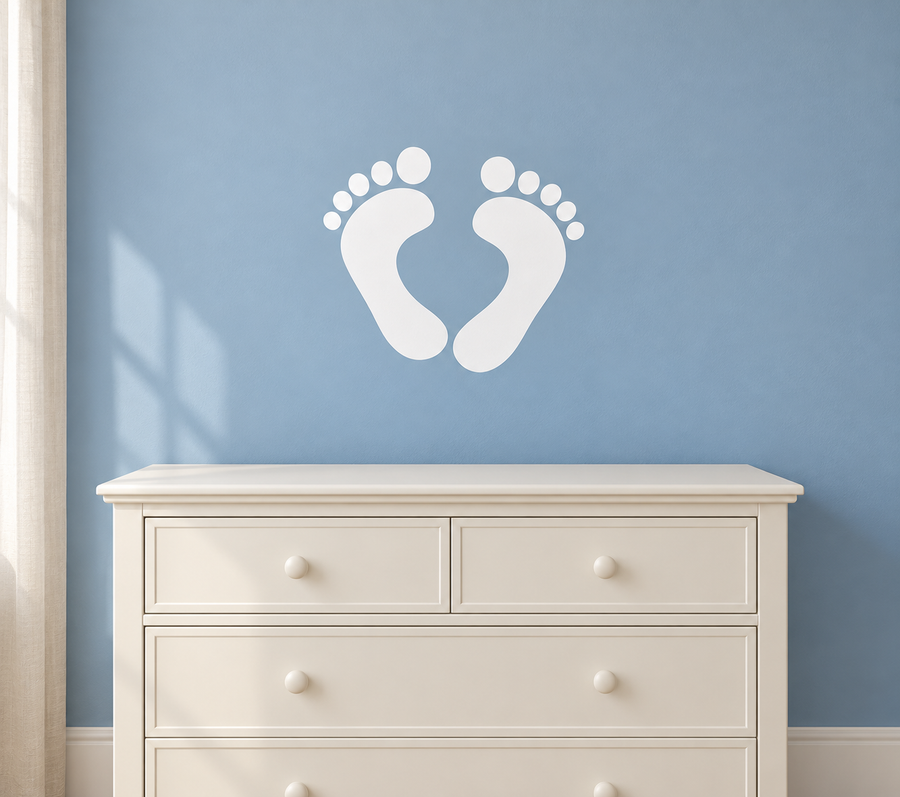 Heart-shaped footprint vinyl decal with two white foot prints and toe pads