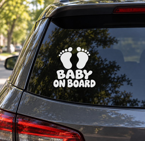 “Baby on Board” vinyl decal with white baby feet icons on a dark window