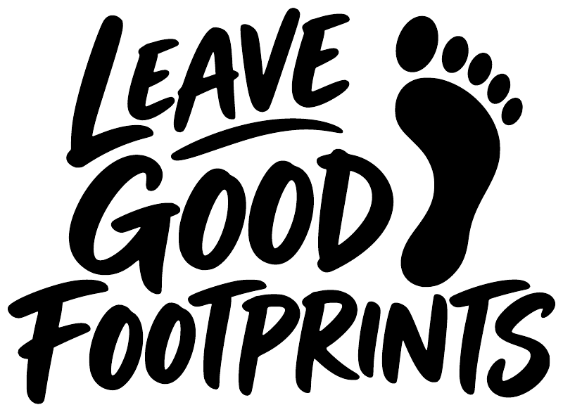 Vinyl decal close-up: black 'Leave Good Footprints' text with paw print