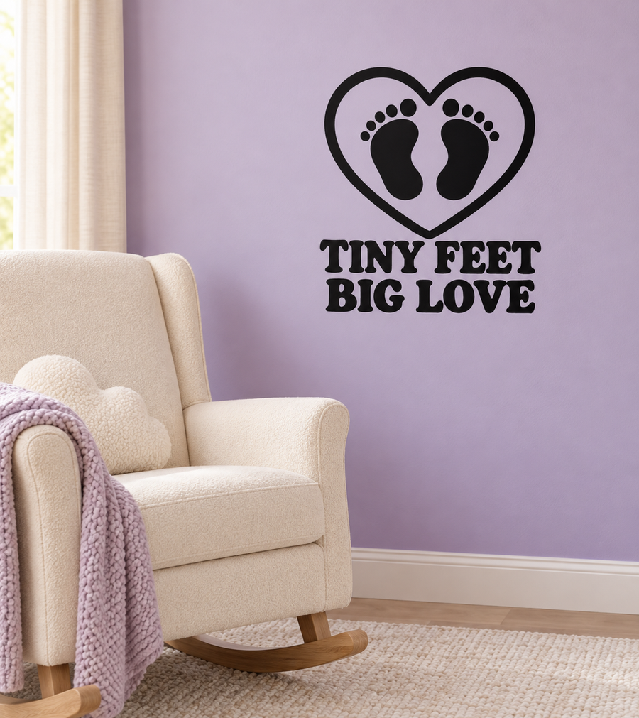 Vinyl decal: heart with baby footprints and “TINY FEET BIG LOVE” text