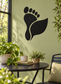 Black footprint and leaf vinyl wall decal