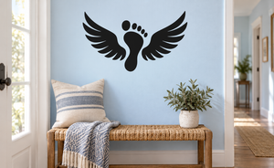 Winged footprint vinyl decal, black silhouette on a wall