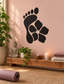 Black footprint vinyl decal with flower and paw print, wall sticker design