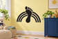 Black footprint with rainbow arc vinyl decal, bold solid shapes