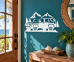 Mountain road SUV vinyl decal with pine trees and mountain peaks, white on teal