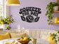 Black vinyl wall decal: 'SQUEEZE THE DAY' with lemon slice and leaves