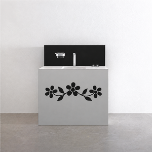 Black daisy-style floral vinyl decal with three blossoms on furniture drawer front