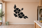 Black poppy flower vinyl wall decal with sweeping corner design