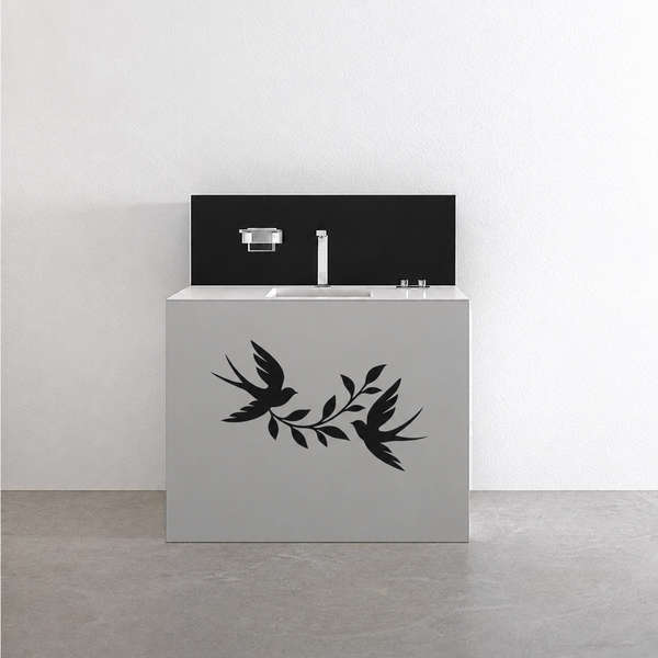 Black swallow ribbon vinyl decal with flying bird and leaf vines on cabinet front