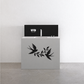 Black swallow ribbon vinyl decal with flying bird and leaf vines on cabinet front