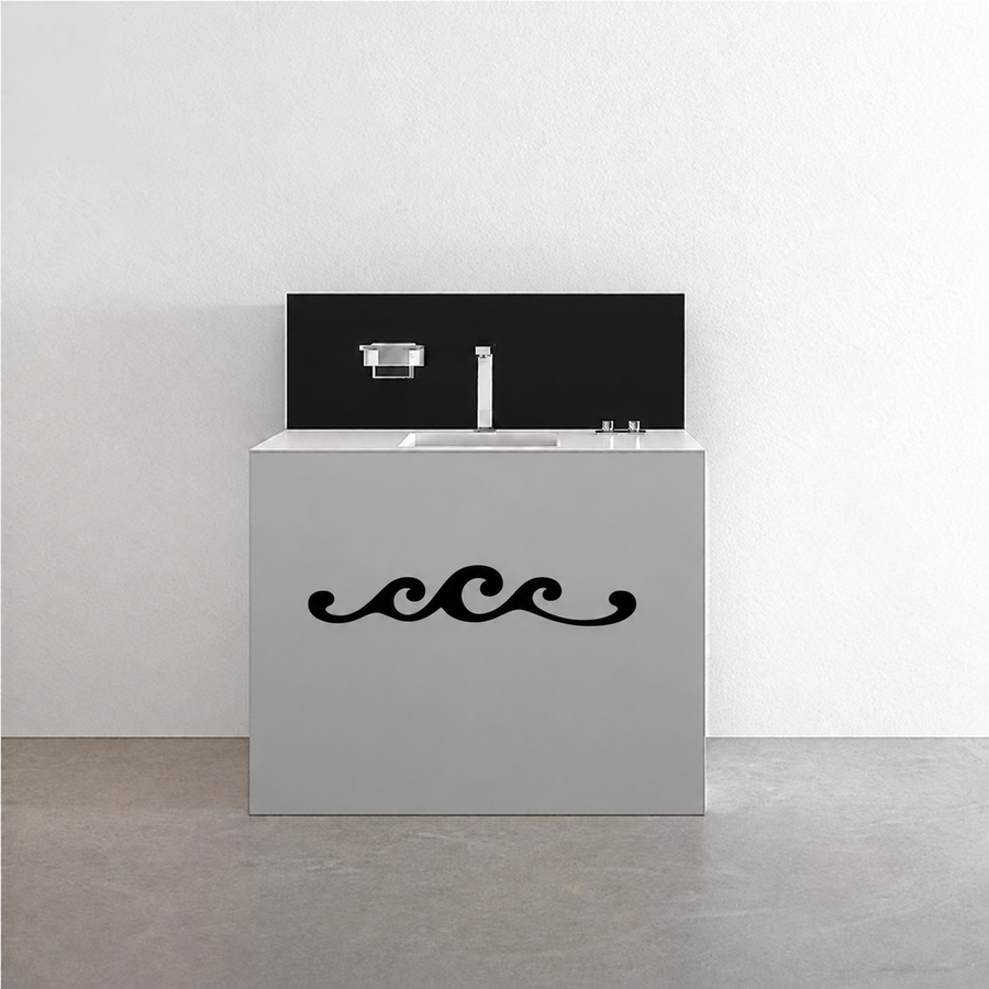 Wave flourish vinyl decal in black, centered on a cabinet front